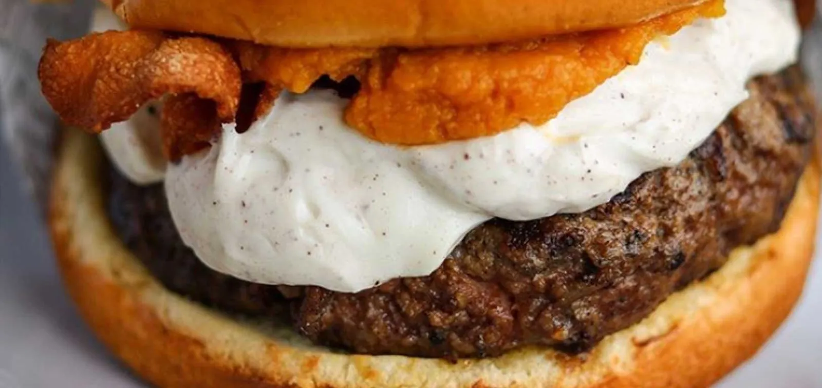 A stacked Capt. Mike's burger